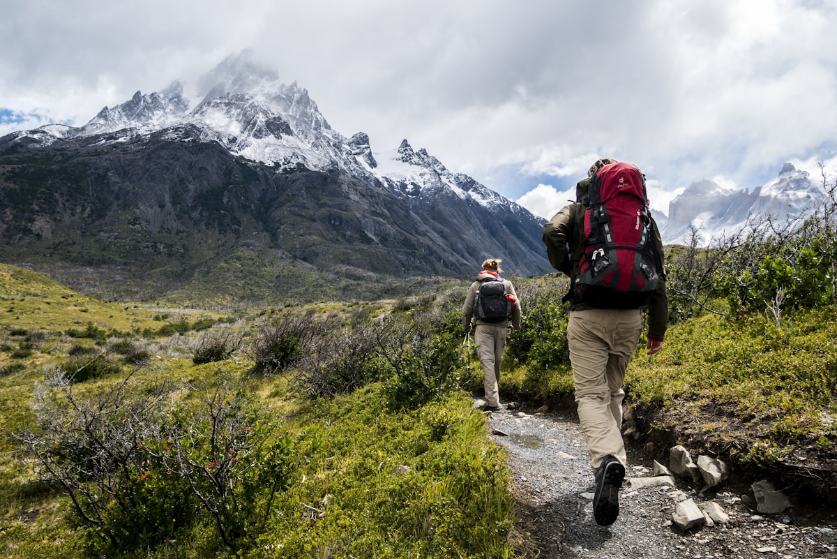 Rugged mountain trail — precision underfoot, every step placed with intention
